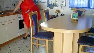 Busty German milf gets fucked on the kitchen table