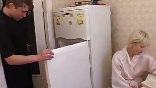 Russian mom nina with her boy in kitchen