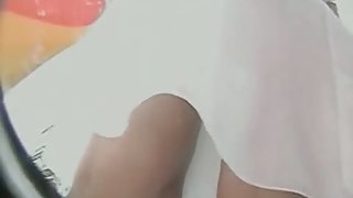White swaying skirt voyeur ass video of a sexy woman